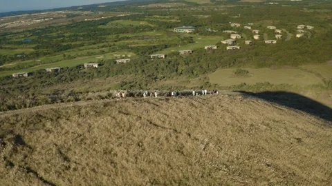 Drone view, people walking on the mountain top. Saebyeol Oreum, Jeju Island. Stock Footage 118639688