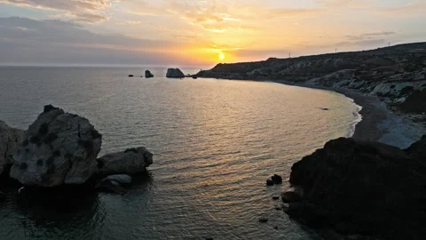 Drone view of Petra tou Romiou at golden sunset in Cyprus. Stockbeeldmateriaal 341675947