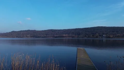 Drone view from the pier on the lake Stock Footage 271495914