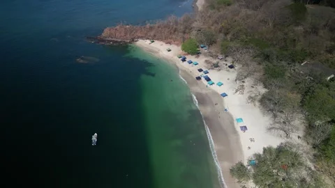 Drone view of Playa Conchal Costa Rica white seashell beach and turquoise water Stock Footage 330037153