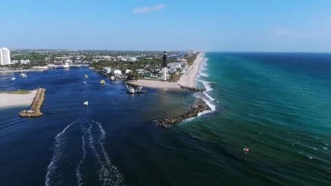 Drone view of Pompano Beach showcasing beautiful contrast between cityscape and Stock Footage 274286337