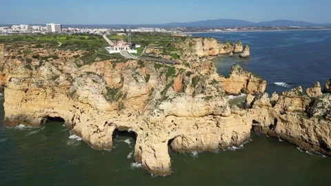 Drone View of Ponta da Piedade Coastline in Lagos, Algarve, Portugal Stock Footage 338989160