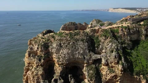 Drone View of Ponta da Piedade Coastline in Lagos, Algarve, Portugal Vídeos de archivo 338989164