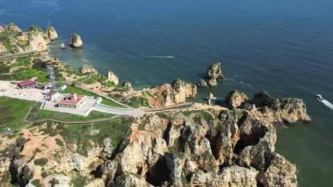 Drone View of Ponta da Piedade Coastline in Lagos, Algarve, Portugal 動画素材 338989330