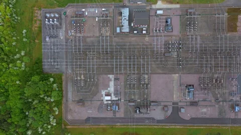 Drone view of power substation in Stevenage UK connecting renewables and fossil 스톡 동영상 310781438