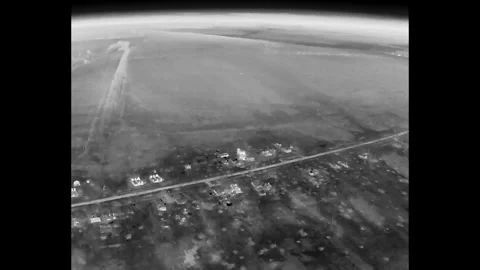 Drone View: Precision Strike and Explosion on Building in War Zone Stockbeeldmateriaal 332357575