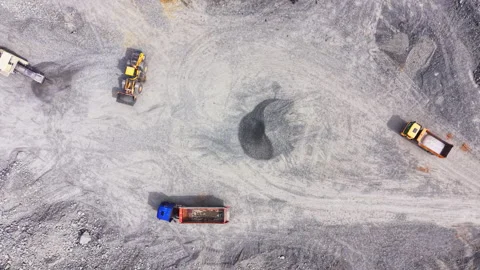 Drone view of quarry loaders and dump trucks converging, Bulgaria Stock-Footage 345151840