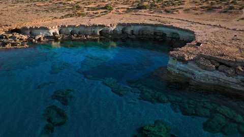 Drone view of a quiet rocky bay at Cape Cavo Greco. Stock Footage 341541527
