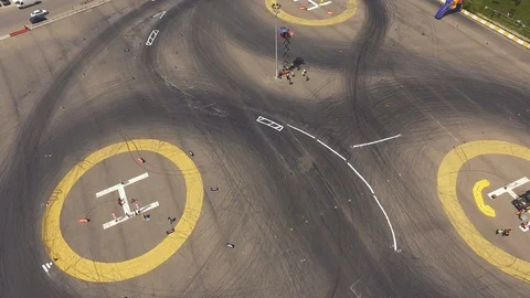 Drone view of a race car drift pist, drift championship ,race cars Stock Footage 129066133