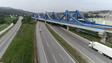Drone view of railway bridge over a highway Stock Footage 111088871