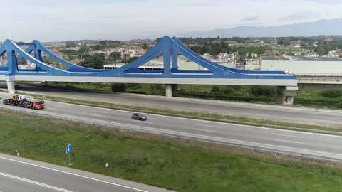 Drone view of railway bridge over a highway Stock Footage 111089123