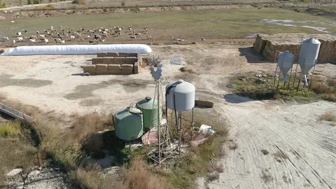 Drone view of a ranch windmill (2) Stock Footage 112301469