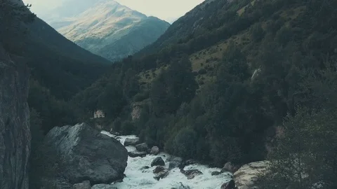 Drone view rapid river in mountain. Mountain trail and stream rocky river Stock Footage 82224127