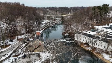 Drone view of the rapids on Brandywine River after snow in Wilmington, Delaware Stock Photos