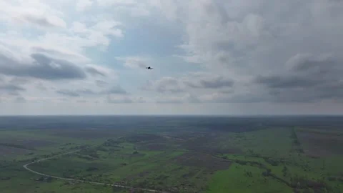 Drone View of a Reconnaissance UAV Flying Over Fields Stockbeeldmateriaal 332357958