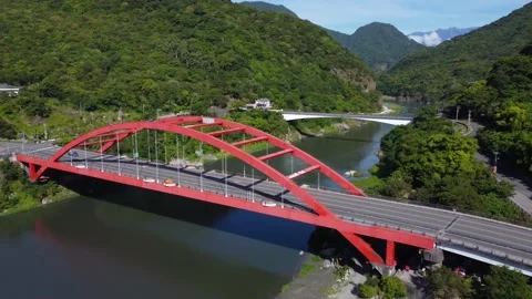 Drone view of the red bridge and natural environment. Stock Footage 220640599