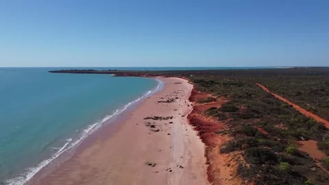 Drone view, red sand, red desert, blue ocean, red sand route, Australia Stock Footage 172530152