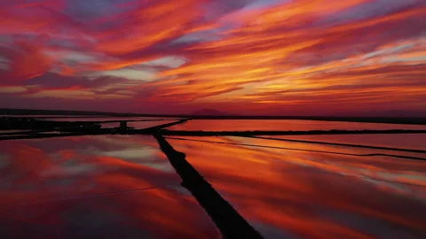 Drone view of red sunset in las Salinas lagoons. Stock Footage 288610272