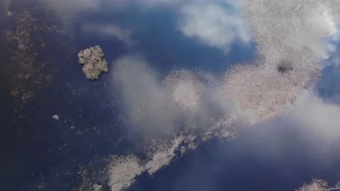 Drone view,  on the reflection of clouds in the water. Stock Footage 218438314