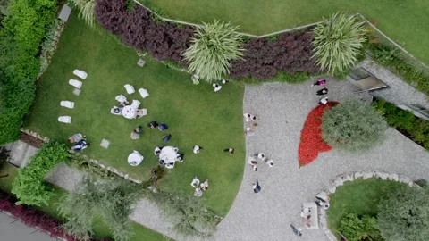 Drone view of the restaurant in green grass, Italy, lake Como Stock Footage 232003847