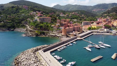 Drone view of Rio Marina surrounded by green hills Video stock 323017840