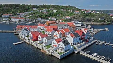 Drone view of Risor Norway showing red and white houses on rocky shore. Stock Footage 327100153