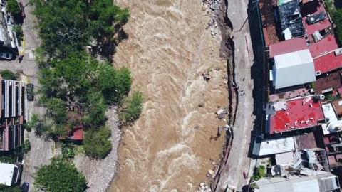 Drone View of a River Current After a Hurricane, Global Warming Stock Footage 253030581