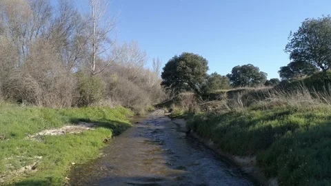 Drone view of a river at low altitude in Madrid, Spain (3) Stock Footage 111989240