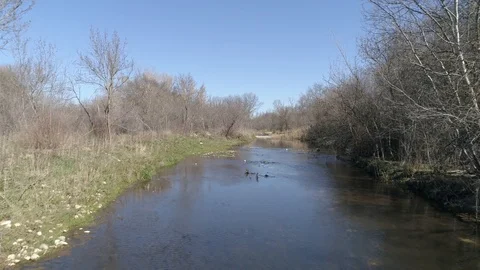 Drone view of a river at low altitude in Madrid, Spain (5) Stock Footage 111989360