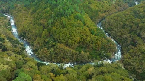 Drone View Of A River In Lush Valley At Fervenza do Toxa Stock Footage 257549790