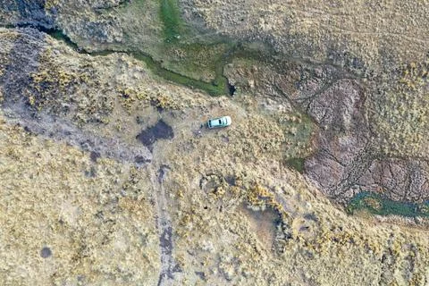DRONE VIEW OF RIVER SOURCES IN THE HIGH ANDEAN MOUNTAINS Stock Photos