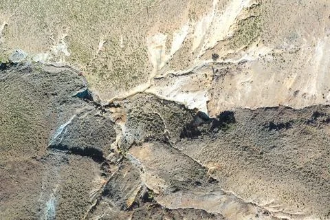 DRONE VIEW OF RIVER SOURCES IN THE HIGH ANDEAN MOUNTAINS Stock Photos
