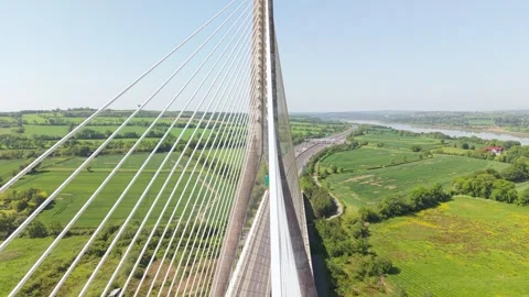 Drone View of River Suir Bridge Cables, Traffic on N25 National Road of Ireland Stock Footage 346418839