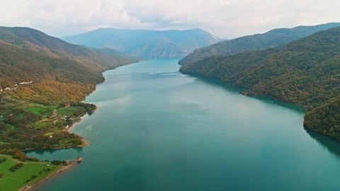 Drone view of the river in the woods. An aerial view of an autumn forest Stock Footage 305604899