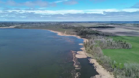 Drone View of a Riverbend with Forest and Farmland from Above Stock Footage 312237434