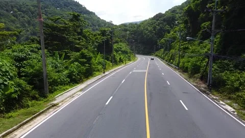 Drone view of the road in the middle of the mountains and the jungle Stock Footage 171972298