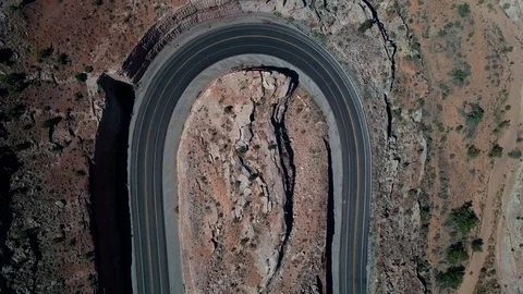 Drone view of road with sharp curves and traffic near Moab - Utah - USA Stock Footage 96225784
