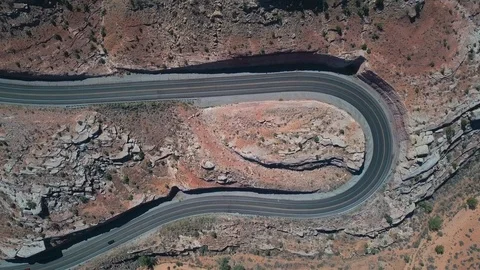 Drone view of road with sharp curves and traffic near Moab - Utah - USA Stock Footage 96225837