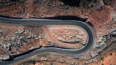 Drone view of road with sharp curves and traffic near Moab - Utah - USA Stock Footage 96226046