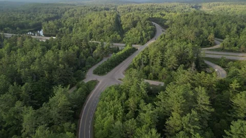 Drone view of Roads, Highway 11 and distance forests (Bracebridge Muskoka On Stock Footage 314233884