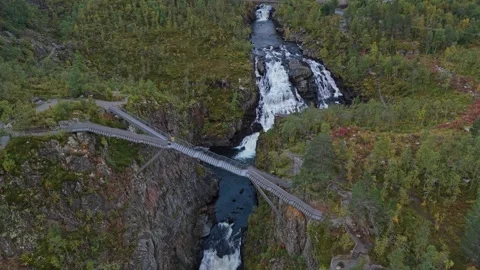 Drone view of roaring Voringfossen waterfall carving through Norway rock Stock Footage 321029088