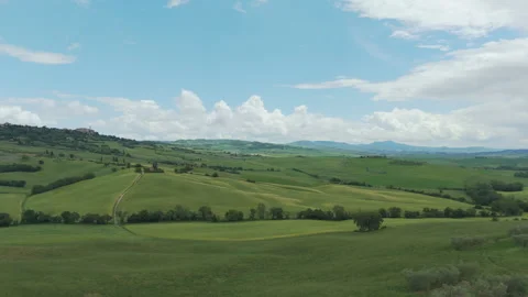Drone View of Rolling Green Hills in Tuscany Stock Footage 335461744