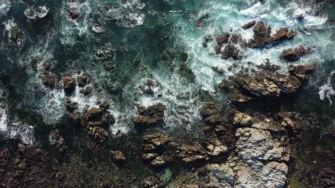 A Drone View of the Rugged Rocks And Sea off Asilomar Beach. Stock Photos