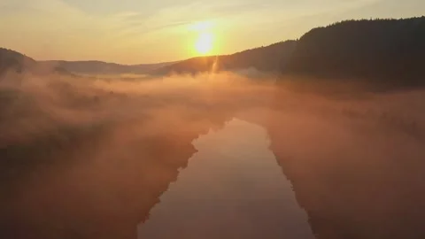 Drone view of rural landscape with river and morning haze Vídeo Stock 242004094