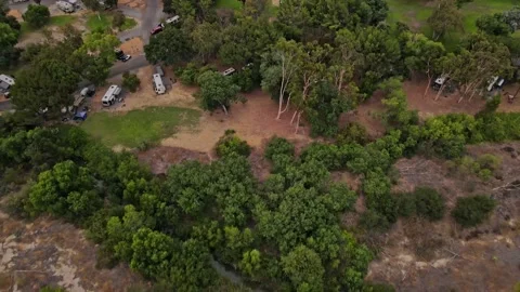 Drone view of RV park in the middle of the woods 動画素材 165465602