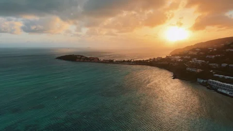 Drone view of Saint Martin island coastline in Philipsburg town during sunset.  Stockbeeldmateriaal 336337080