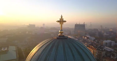 Drone view of Saint Sava Temple's cupola and surrounding smog Stock Footage 166115244