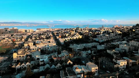 Drone view of San Francisco Sunset district row houses extending toward Stock Footage 337462372