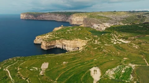 Drone view of Sanap Cliffs, Gozo island. Green fields, sea. Maltese island Stock Footage 329988885