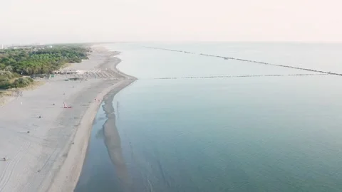 Drone view of sandy beach with umbrellas and gazebos Stock Footage 164641521